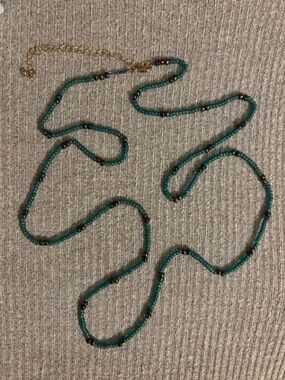 Bohemian theme blue and black beaded necklace w gold tone chain extender